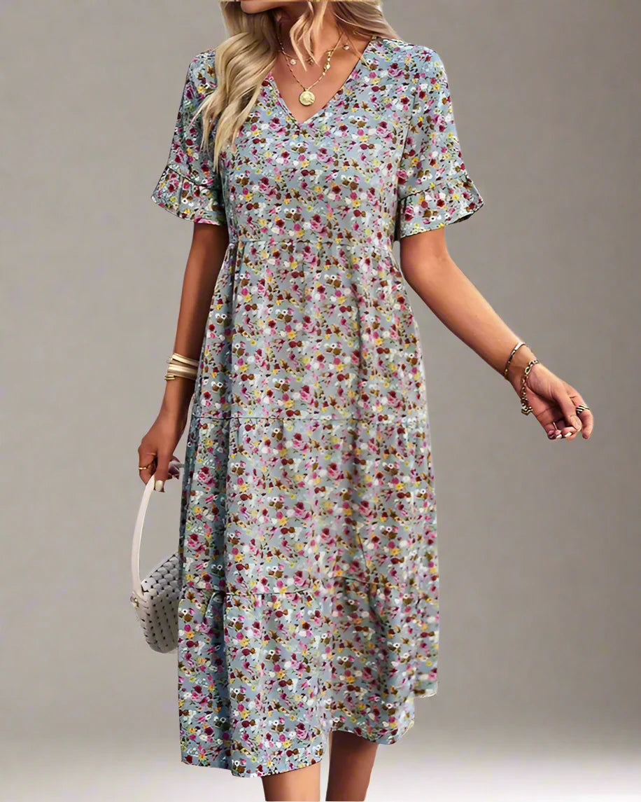 Woman wearing a floral dress on a white background