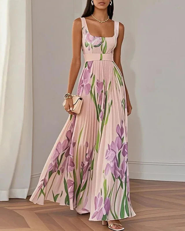 Woman wearing a floral dress with a plain background