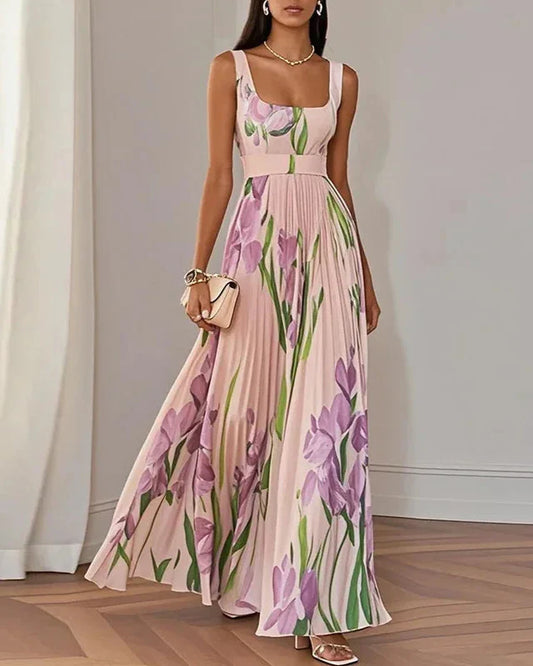 Woman wearing a floral dress with a plain background